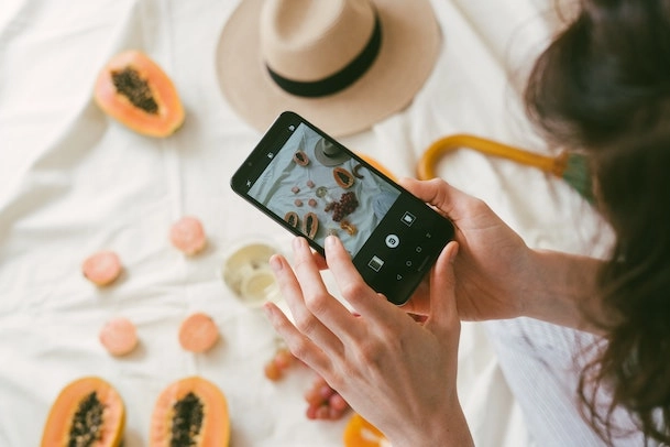 Image of blogger taking photos for blog