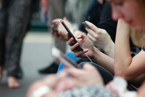 Image of worker using their mobile phone
